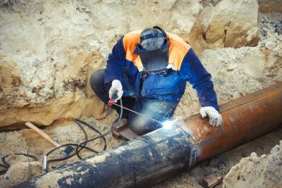 welder doing pipe welding services